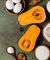 Butternut squash cut in half on display