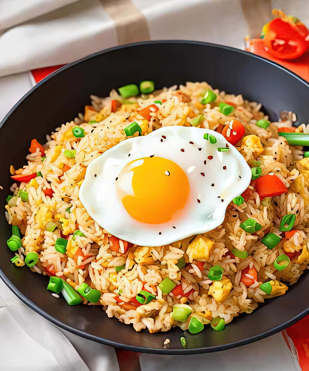 Mixed fried rice with sunnyside egg on top