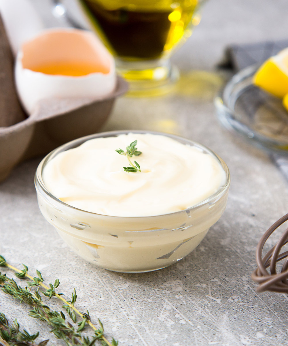 Small clear bowl of mayo
