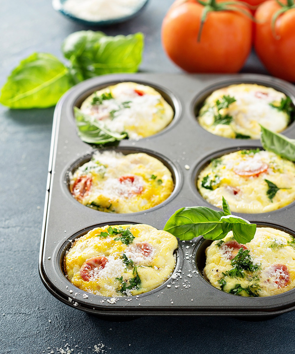 Six mini frittatas in a muffin tin