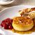 Blue cheese flan with candied strawberries