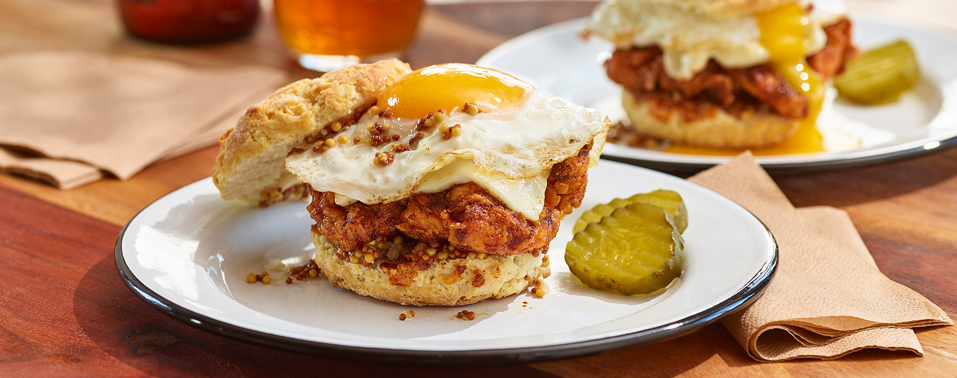 Nashville hot chicken with fried egg and side of pickles