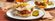 Nashville hot chicken with fried egg and side of pickles