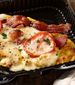 Kentucky brown omelet in black take out box