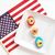 Red, white, and blue deviled eggs in a row