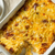 Cheesy breakfast strata with bacon and eggs.